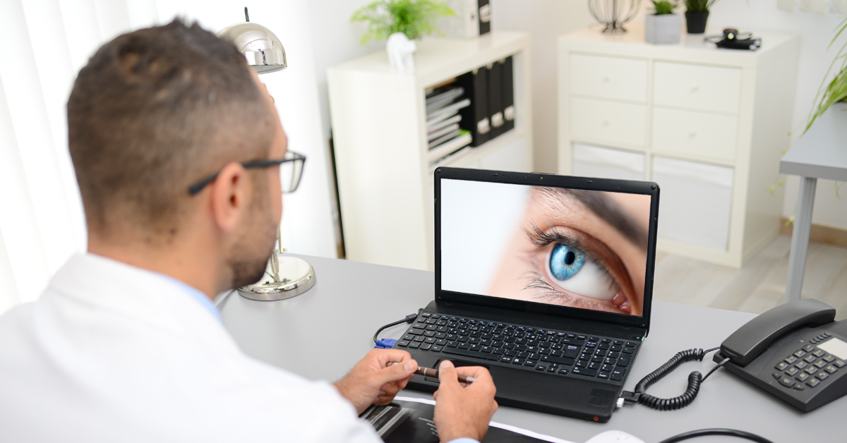 eye care provider examining the eye of a patient using telemedicine 