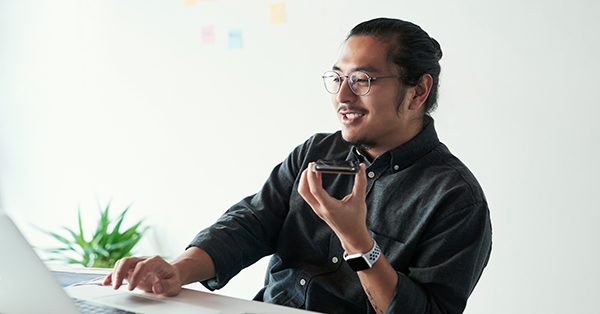 A customer using voice search to find local business