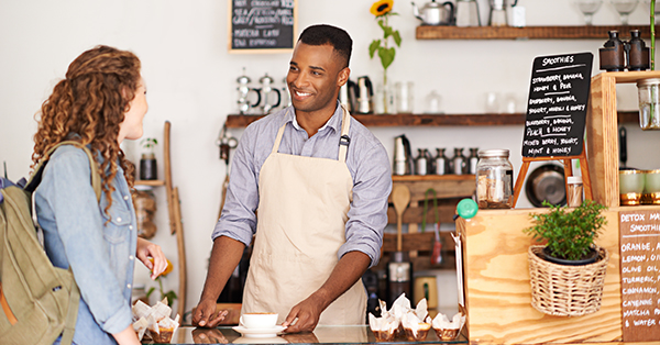 a business owner engaging with customer