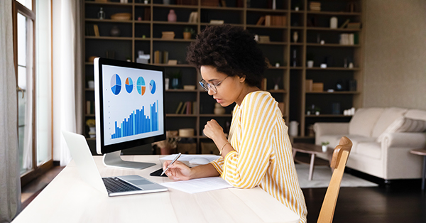 Businesswoman monitoring Social Media Progress