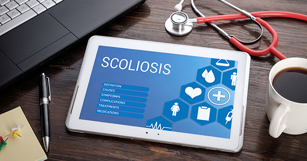 an ipad displaying about scoliosis