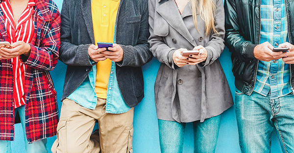 Group of friends using smart mobile phones app