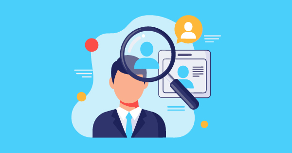 magnifying glass zooming in on a businessman silhouette