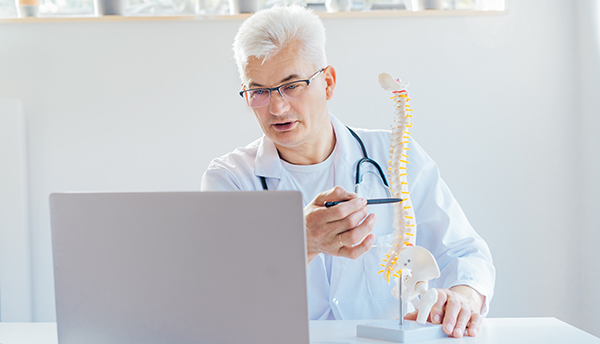 Doctor using social media to teach about spinal injury