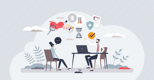 Patient and doctor discussing health information at office desk